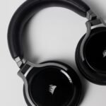 Stylish black over-ear wireless headphones on a clean white background.