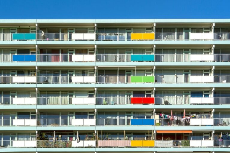 Brightly colored apartment balconies in Zoetermeer, showcasing urban living.