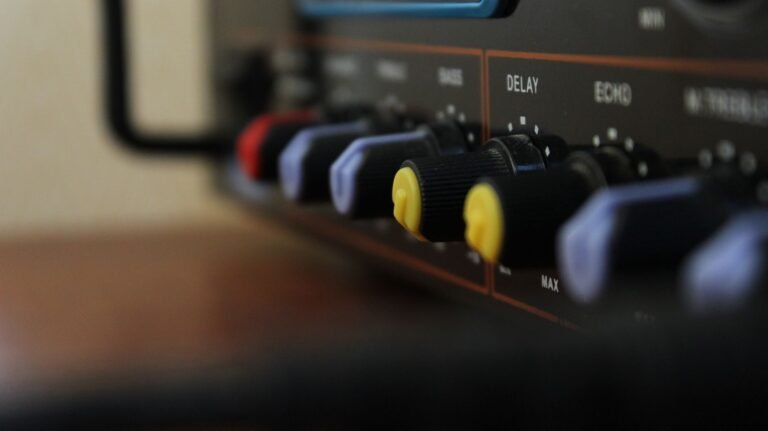Detailed view of colorful control knobs on audio equipment showcasing modern technology.