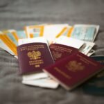 Close-up of Polish passports and travel tickets symbolizing travel and adventure.