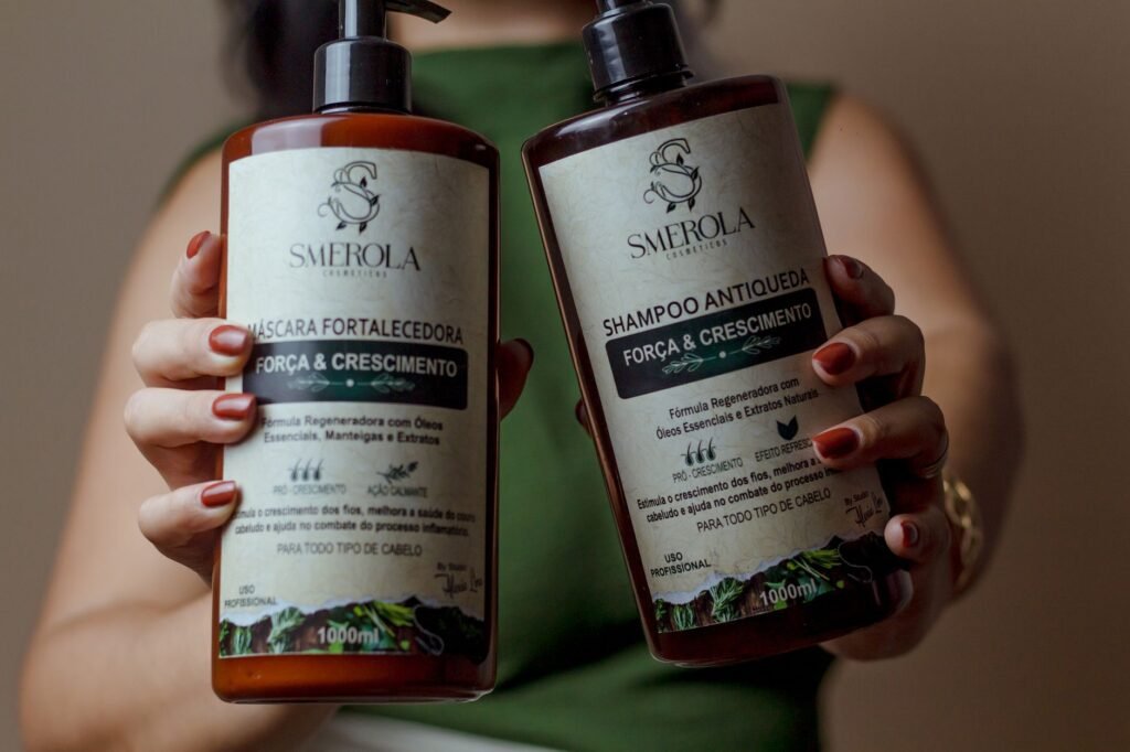 Close-up of Smerola hair care bottles focusing on growth and strength benefits.