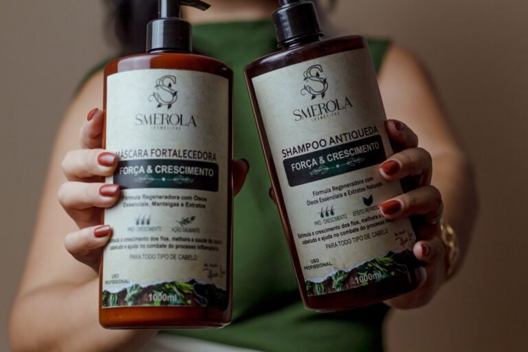 Close-up of Smerola hair care bottles focusing on growth and strength benefits.