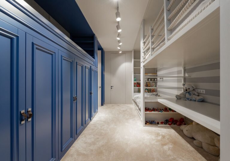 Creative design of bedroom with built in wardrobe and bed between collection of toys in light house